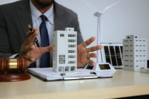 A lawyer specializing in real estate law handles property sales, mortgages, and litigation